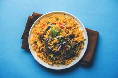 Masala pirinç veya masale bhat - baharatlı sebze kızarmış pilav / biryani veya Pulav genellikle sırasında yapılan düğün durumlarda maharashtra, Hindistan