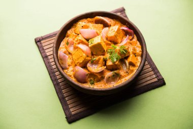 Paneer Do Pyaza  is a popular punjabi vegetarian recipe using cubes of cottage cheese  with lots of onion in a gravy clipart