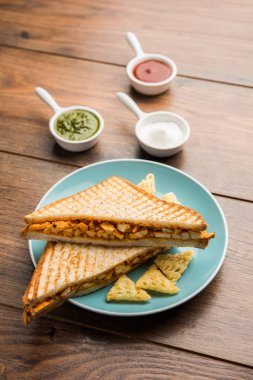 Paneer tikka sandviç - bir sürümüdür popüler Hint turşusu Domates ketçap ile süzme peynir köri kullanarak sandviç nane