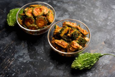 Karela Achar / Bitter Gourd Pickle, popular Indian recipe clipart