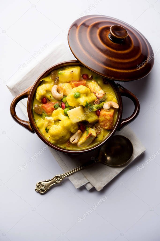 Navratan Korma is a rich, creamy and flavorful Mughlai dish  from India that literally translates to nine-gem curry. The gems are the fruits, vegetables and nuts that make up the curry. 