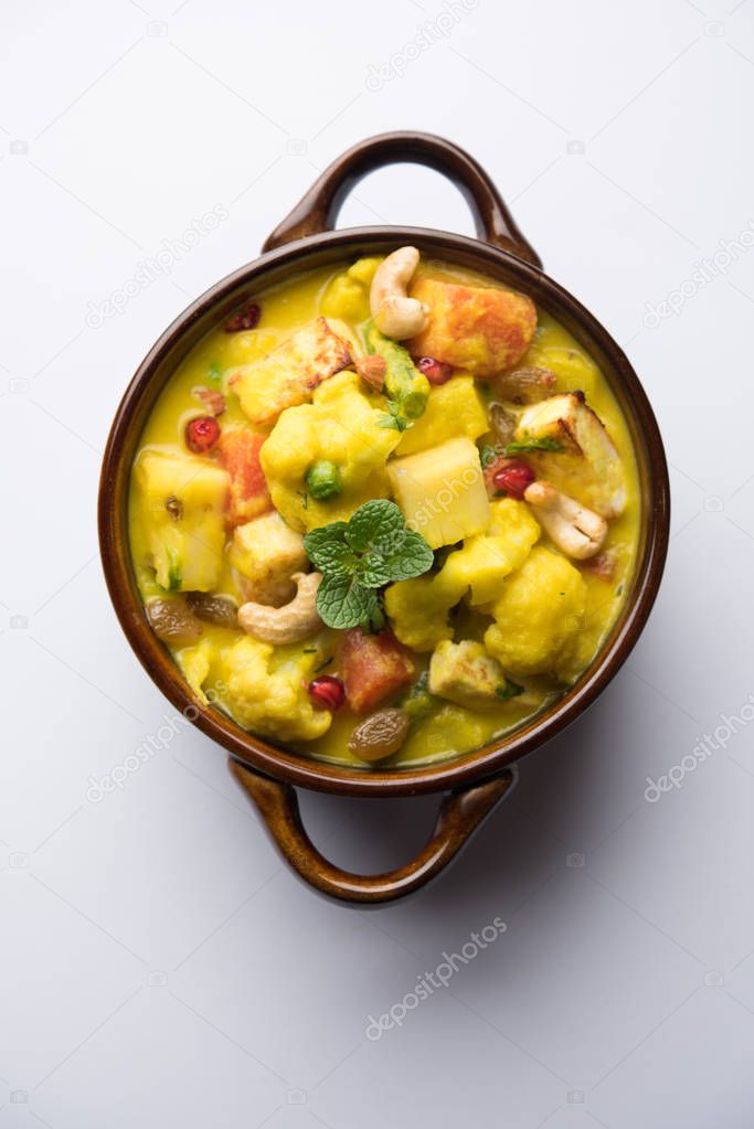 Navratan Korma is a rich, creamy and flavorful Mughlai dish  from India that literally translates to nine-gem curry. The gems are the fruits, vegetables and nuts that make up the curry. 