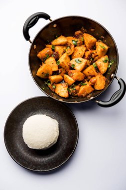 Masala Idlies - Domates ketçap ile artık ile tembel tembel kullanılarak yapılan Hindistan aperatif servis Güney kızarmış. seçici odak