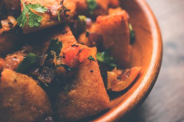 Masala Idlies - Domates ketçap ile artık ile tembel tembel kullanılarak yapılan Hindistan aperatif servis Güney kızarmış. seçici odak