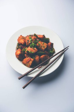 Schezwan Idli veya Mançurya tembel tembel, lezzetli Hint-Çin yemek tarifi. seçici odak