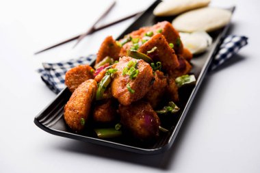 Schezwan Idli veya Mançurya tembel tembel, lezzetli Hint-Çin yemek tarifi. seçici odak