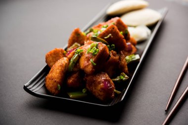 Schezwan Idli veya Mançurya tembel tembel, lezzetli Hint-Çin yemek tarifi. seçici odak