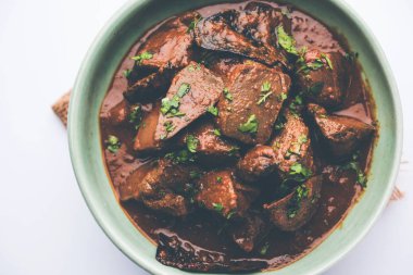 Koyun karaciğer fry veya Kaleji masala, Hindistan ve Pakistan popüler Sigara Vejetaryen yemek tarifi. Kuru veya bir kase, karahi veya plaka köri ile servis