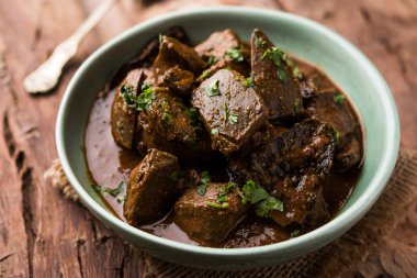 Koyun karaciğer fry veya Kaleji masala, Hindistan ve Pakistan popüler Sigara Vejetaryen yemek tarifi. Kuru veya bir kase, karahi veya plaka köri ile servis