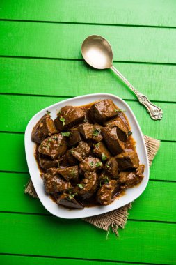 Koyun karaciğer fry veya Kaleji masala, Hindistan ve Pakistan popüler Sigara Vejetaryen yemek tarifi. Kuru veya bir kase, karahi veya plaka köri ile servis