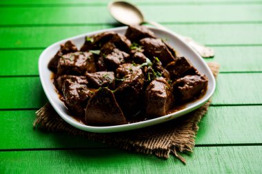 Koyun karaciğer fry veya Kaleji masala, Hindistan ve Pakistan popüler Sigara Vejetaryen yemek tarifi. Kuru veya bir kase, karahi veya plaka köri ile servis