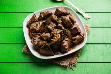 Koyun karaciğer fry veya Kaleji masala, Hindistan ve Pakistan popüler Sigara Vejetaryen yemek tarifi. Kuru veya bir kase, karahi veya plaka köri ile servis