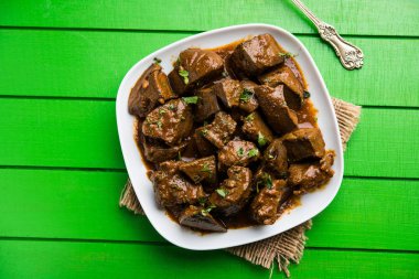 Koyun karaciğer fry veya Kaleji masala, Hindistan ve Pakistan popüler Sigara Vejetaryen yemek tarifi. Kuru veya bir kase, karahi veya plaka köri ile servis