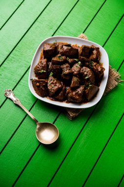 Koyun karaciğer fry veya Kaleji masala, Hindistan ve Pakistan popüler Sigara Vejetaryen yemek tarifi. Kuru veya bir kase, karahi veya plaka köri ile servis