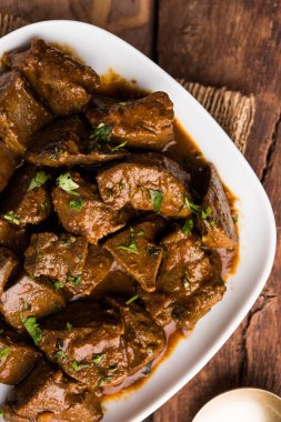 Koyun karaciğer fry veya Kaleji masala, Hindistan ve Pakistan popüler Sigara Vejetaryen yemek tarifi. Kuru veya bir kase, karahi veya plaka köri ile servis