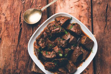 Koyun karaciğer fry veya Kaleji masala, Hindistan ve Pakistan popüler Sigara Vejetaryen yemek tarifi. Kuru veya bir kase, karahi veya plaka köri ile servis