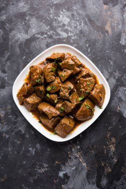 Koyun karaciğer fry veya Kaleji masala, Hindistan ve Pakistan popüler Sigara Vejetaryen yemek tarifi. Kuru veya bir kase, karahi veya plaka köri ile servis
