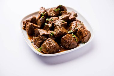 Koyun karaciğer fry veya Kaleji masala, Hindistan ve Pakistan popüler Sigara Vejetaryen yemek tarifi. Kuru veya bir kase, karahi veya plaka köri ile servis