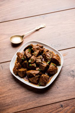 Koyun karaciğer fry veya Kaleji masala, Hindistan ve Pakistan popüler Sigara Vejetaryen yemek tarifi. Kuru veya bir kase, karahi veya plaka köri ile servis