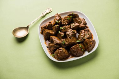 Koyun karaciğer fry veya Kaleji masala, Hindistan ve Pakistan popüler Sigara Vejetaryen yemek tarifi. Kuru veya bir kase, karahi veya plaka köri ile servis