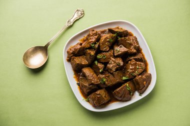 Koyun karaciğer fry veya Kaleji masala, Hindistan ve Pakistan popüler Sigara Vejetaryen yemek tarifi. Kuru veya bir kase, karahi veya plaka köri ile servis