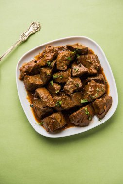 Koyun karaciğer fry veya Kaleji masala, Hindistan ve Pakistan popüler Sigara Vejetaryen yemek tarifi. Kuru veya bir kase, karahi veya plaka köri ile servis