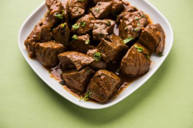 Koyun karaciğer fry veya Kaleji masala, Hindistan ve Pakistan popüler Sigara Vejetaryen yemek tarifi. Kuru veya bir kase, karahi veya plaka köri ile servis