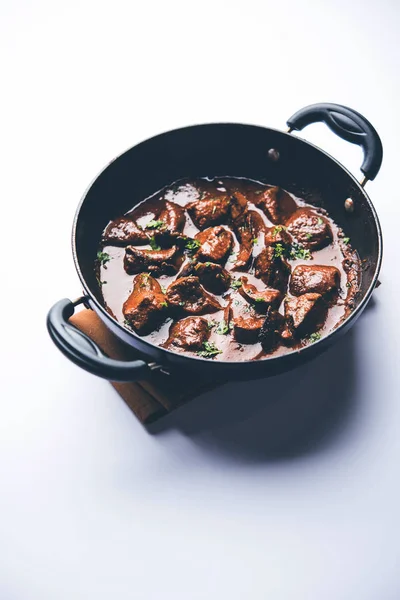 Mutton Liver fry or Kaleji masala, popular Non vegetarian recipe from India and Pakistan. served dry or with curry in a bowl, karahi or plate