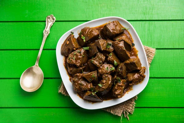 Koyun karaciğer fry veya Kaleji masala, Hindistan ve Pakistan popüler Sigara Vejetaryen yemek tarifi. Kuru veya bir kase, karahi veya plaka köri ile servis