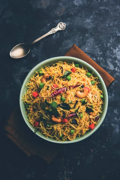 stock image Semiya Upma or Vermicelli Uppuma or uppittu is a popular breakfast menu from south India. served in a bowl. selective focus