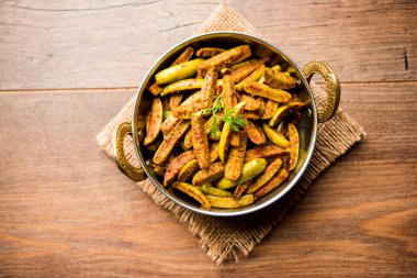 Tindora Sabzi / Tendli / tondli Fry olarak da bilinen Ivy Gourd kızartma tarifi. seçici odak