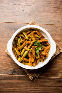 Tindora Sabzi / Tendli / tondli Fry olarak da bilinen Ivy Gourd kızartma tarifi. seçici odak