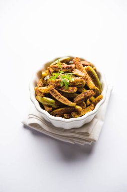 Tindora Sabzi / Tendli / tondli Fry olarak da bilinen Ivy Gourd kızartma tarifi. seçici odak