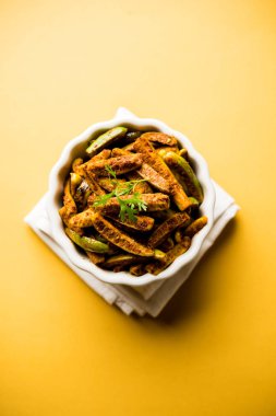 Tindora Sabzi / Tendli / tondli Fry olarak da bilinen Ivy Gourd kızartma tarifi. seçici odak