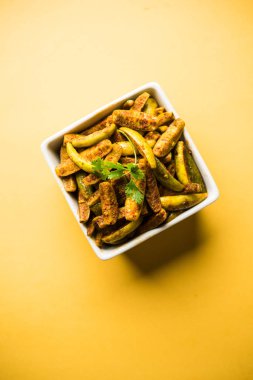 Tindora Sabzi / Tendli / tondli Fry olarak da bilinen Ivy Gourd kızartma tarifi. seçici odak