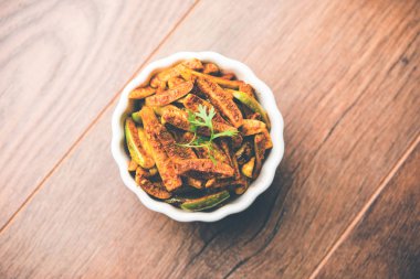 Tindora Sabzi / Tendli / tondli Fry olarak da bilinen Ivy Gourd kızartma tarifi. seçici odak