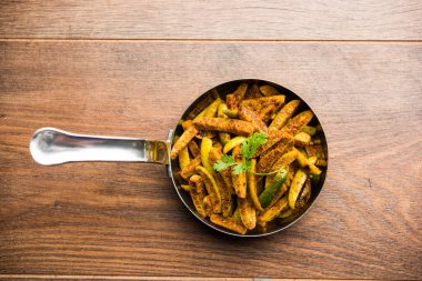 Tindora Sabzi / Tendli / tondli Fry olarak da bilinen Ivy Gourd kızartma tarifi. seçici odak