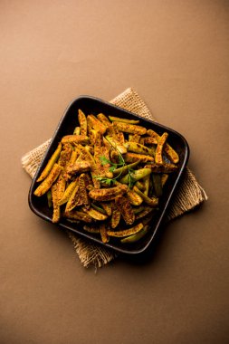 Tindora Sabzi / Tendli / tondli Fry olarak da bilinen Ivy Gourd kızartma tarifi. seçici odak
