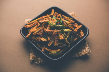 Tindora Sabzi / Tendli / tondli Fry olarak da bilinen Ivy Gourd kızartma tarifi. seçici odak