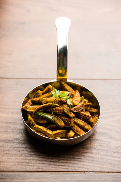Tindora Sabzi / Tendli / tondli Fry olarak da bilinen Ivy Gourd kızartma tarifi. seçici odak
