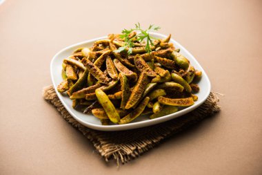 Tindora Sabzi / Tendli / tondli Fry olarak da bilinen Ivy Gourd kızartma tarifi. seçici odak