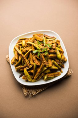 Tindora Sabzi / Tendli / tondli Fry olarak da bilinen Ivy Gourd kızartma tarifi. seçici odak