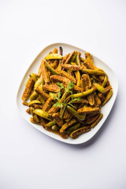 Tindora Sabzi / Tendli / tondli Fry olarak da bilinen Ivy Gourd kızartma tarifi. seçici odak
