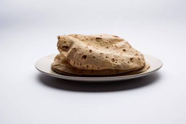 Çapati / Tava Roti Hint ekmek veya Fulka/phulka da bilinir. Öğle/akşam yemeği Hindistan/Pakistan içinde ana madde. seçici odak
