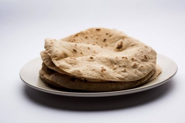 Çapati / Tava Roti Hint ekmek veya Fulka/phulka da bilinir. Öğle/akşam yemeği Hindistan/Pakistan içinde ana madde. seçici odak