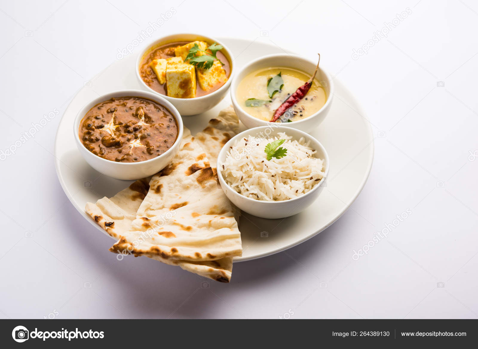 Indian Vegetarian Platter Thali Having Palak Paneer Butter Masala Dal