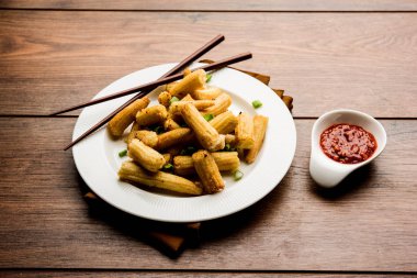 Bebek Mısır Mançurya kuru - popüler Hindi-çin başlangıç tarifi. seçici odaklama