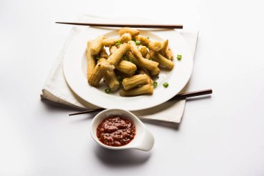 Bebek Mısır Mançurya kuru - popüler Hindi-çin başlangıç tarifi. seçici odaklama