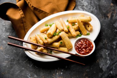 Bebek Mısır Mançurya kuru - popüler Hindi-çin başlangıç tarifi. seçici odaklama