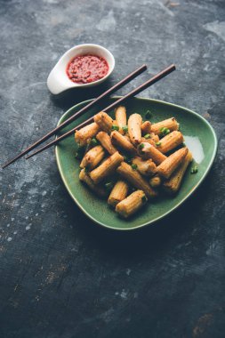 Bebek Mısır Mançurya kuru - popüler Hindi-çin başlangıç tarifi. seçici odaklama